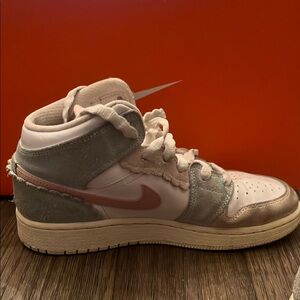 Jordan Nike White, blue, and pink High-Top Sneakers